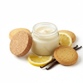 Sugar Cookie Butter Balm in a clear glass jar with sugar cookie, lemon and vanilla props