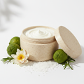Coastal Theory Body Scrub in a rice husk jar with sea salt, water lily and bergamot props