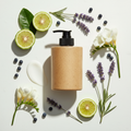 Bergamot Solstice Body Lotion 8oz - rice husk bottle with black pump top surrounded by bergamot, lavender, juniper and freesia