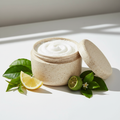 Morning Mercy Body Scrub in a rice husk jar with green tea, lemon and bergamot props